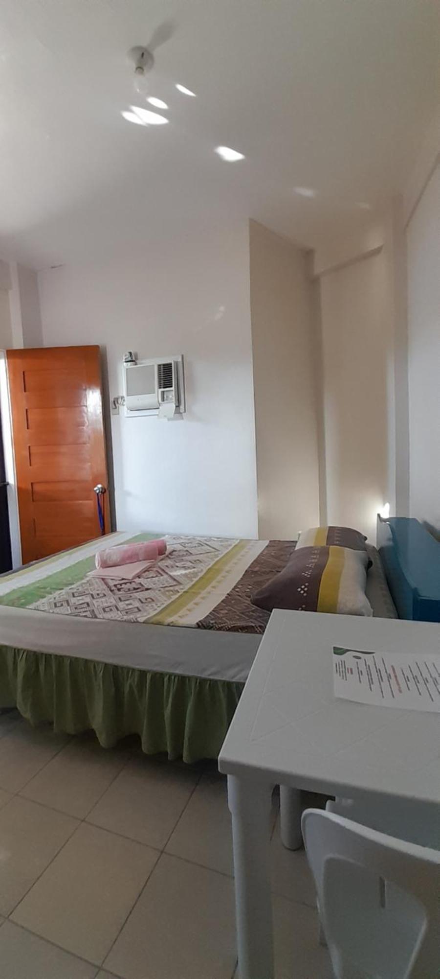 Reynaldo'S Upstairs Bed and Breakfast Puerto Galera Buitenkant foto