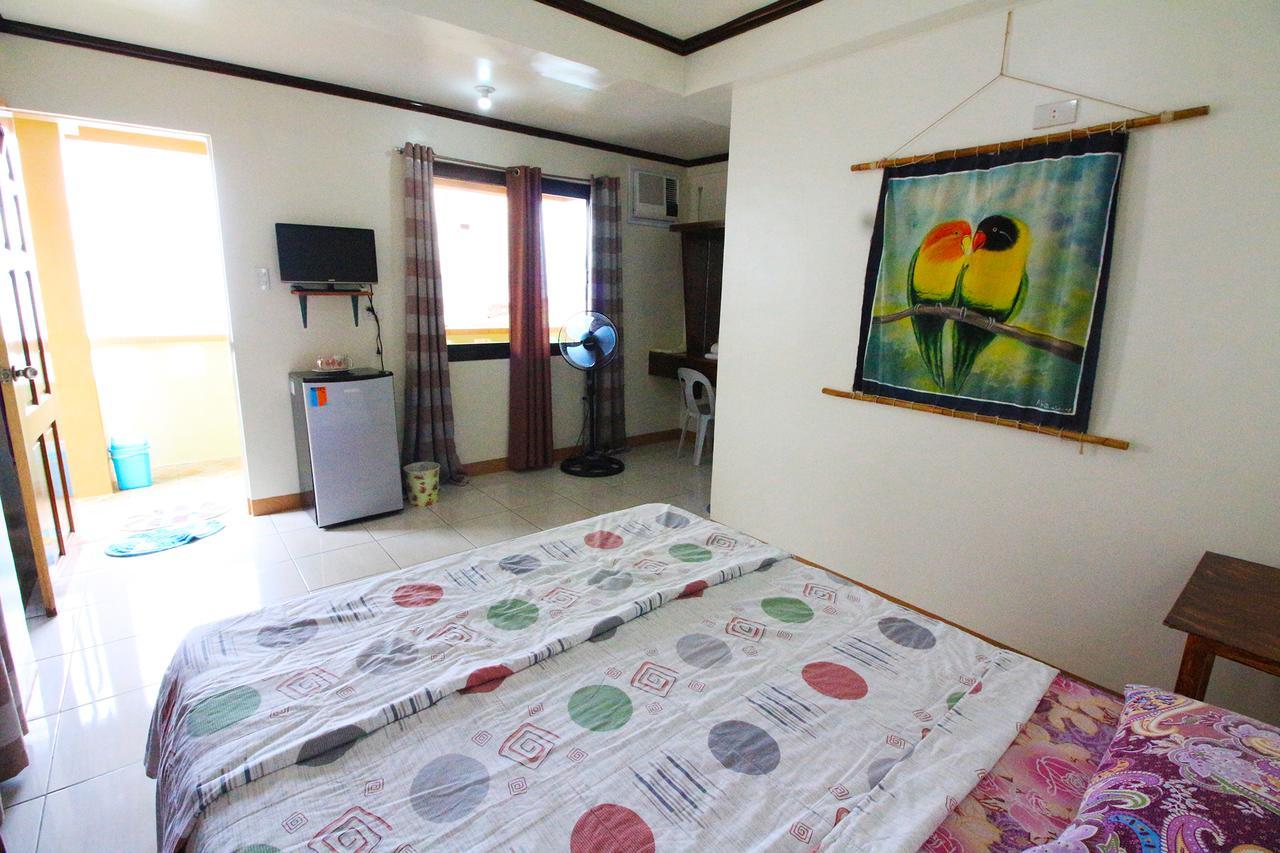 Reynaldo'S Upstairs Bed and Breakfast Puerto Galera Buitenkant foto